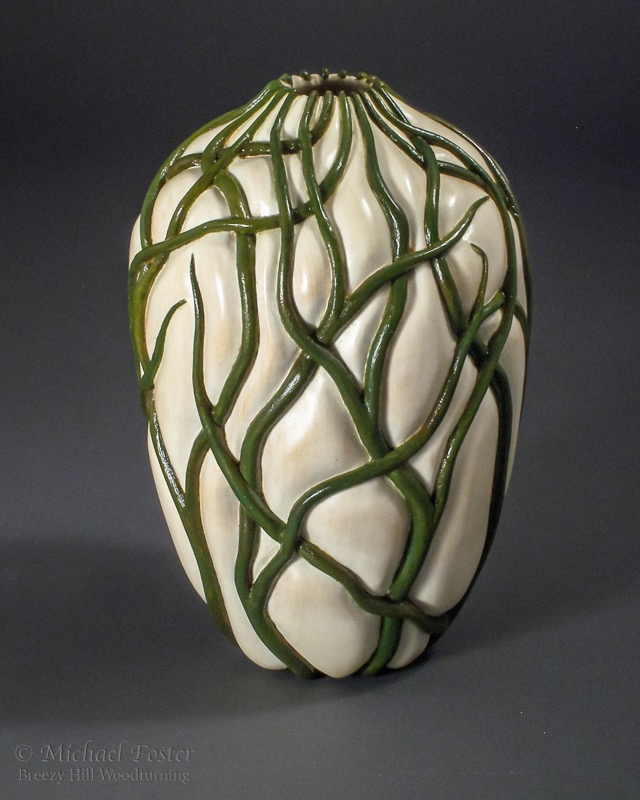 Squeeze-   Split leaf maple, bleach, acrylics, lacquer, 8.5&rdquo;H x 6&rdquo;D----AVAILABLE