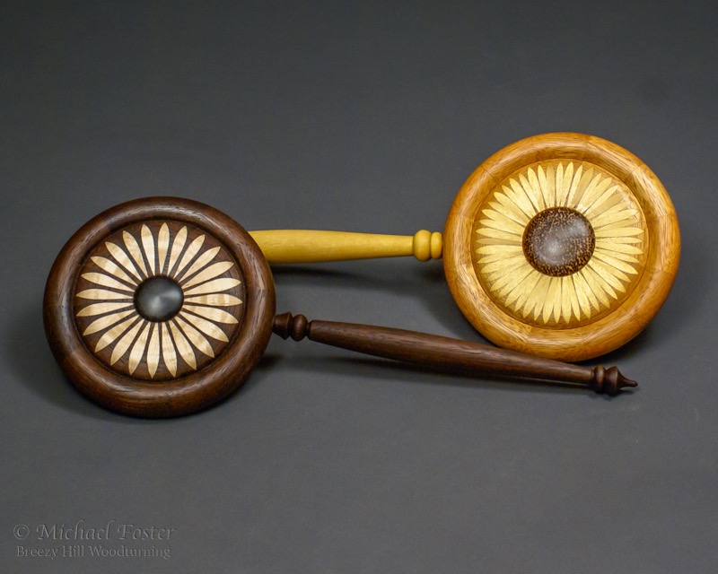 Segmented Mirrors-   Yellowheart, Mahogany, Black Palm<br>Walnut, curly maple, ebony
