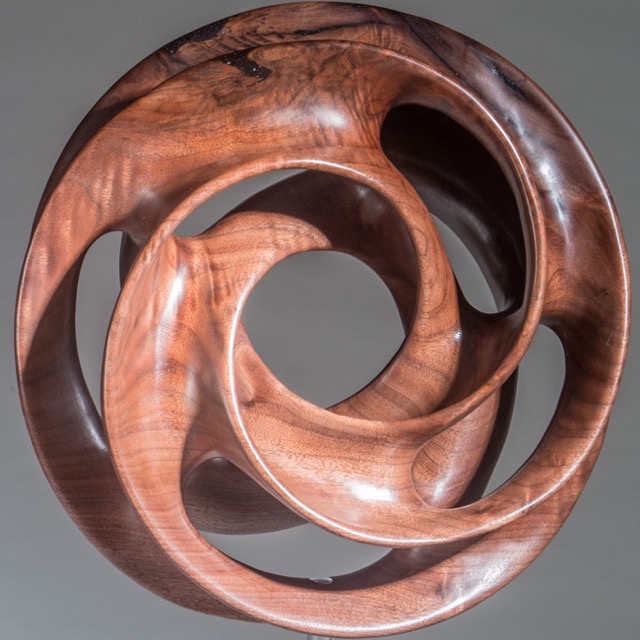 Convoluted-   Walnut, Acrylic, Waterlox, Microcrystalline wax, Form is 11&rdquo; x 4.25&rdquo;, 20&rdquo; High on pedestal----SOLD