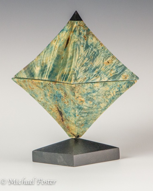 Octahedron II-   My first attempt at the form.  I did not get the faces quite perfect and discovered a large bark inclusion when turning the form.----AVAILABLE