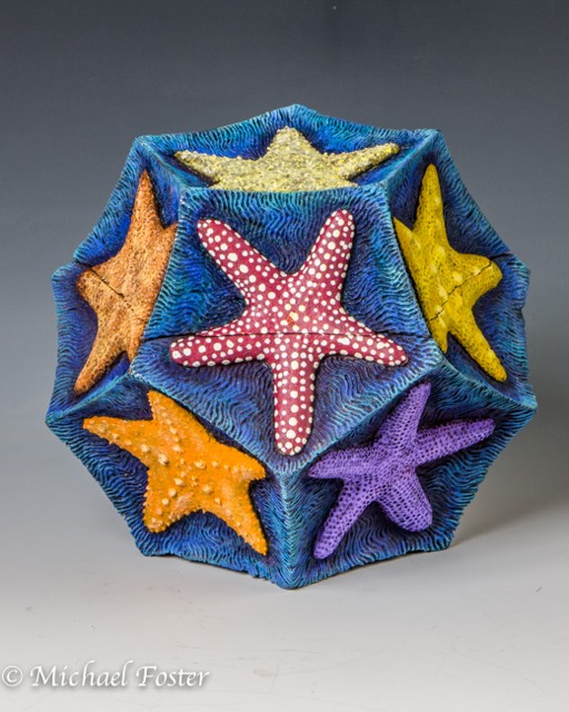Platonic Ocean-   A dodecahedron composed of 12 identical pentagons.  Pentagonal symmetry reminded me of starfish, hence the inspiration for the carving.----AVAILABLE