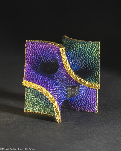 Batwing- a cube turned on 4 axes with 8 mountings then carved to final form----Available