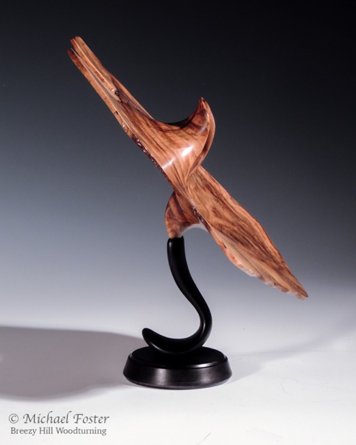 Distortion II-   Maple burl, lacquer, 9&rdquo; x 12&rdquo; x 4&rdquo;,   11&rdquo; high on stand.  Maple Stand, Feibings dye, lacquer.----SOLD