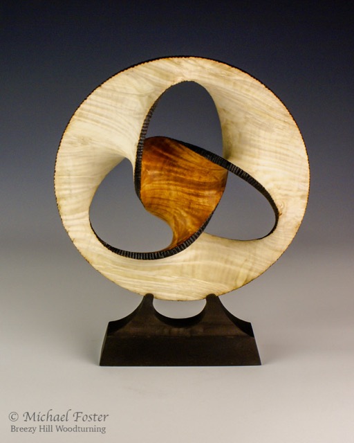Inversion-   A minimal surface that joins a trefoil knot with a circle as the outer edge.----SOLD