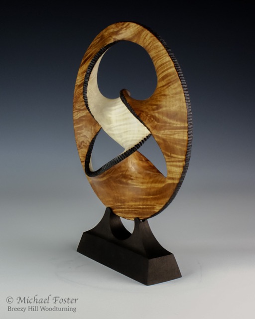 Inversion-   Figured big leaf maple, Bleach, stain, pyrography,  9