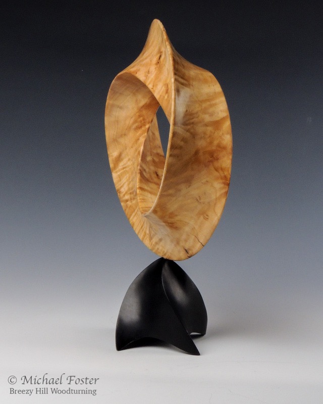 A Mathematician's Dream-   Elder Burl 9&rdquo; x 3&rdquo;, Bush oil.  Birch base ebonized with leather dye, 13&rdquo; H with base----SOLD